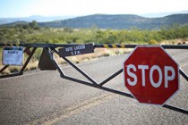 At Montezuma Castle National Monument, closed gate disappointments visitors