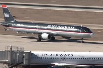 Government settles suit, clearing way for US Airways-American Airlines merger