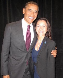 Linda Valenzuela, Owner of MIA Cosmetics, stands next to President Barack Obama